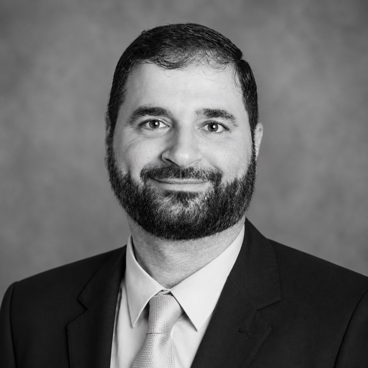 Headshot photograph of Ahmad Al-Moujahed, MD, PhD